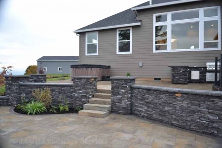 Paver Patio, Stone Walls & Partial View of Outdoor Kitchen