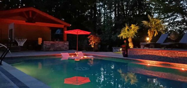 Mixture of Tree Uplighting & Pool Lighting from one of our Installations in Beaverton