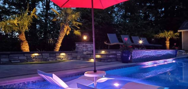Mixture of Tree Uplighting, Hardscape Lights, Post Lights & Pool Lighting from one of our Installations in Beaverton