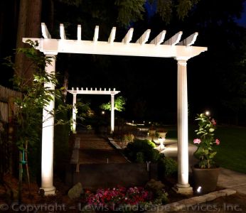 Low-Voltage Accent Lighting on Arbors at a Landscape Job We Did in Lake Oswego, Oregon
